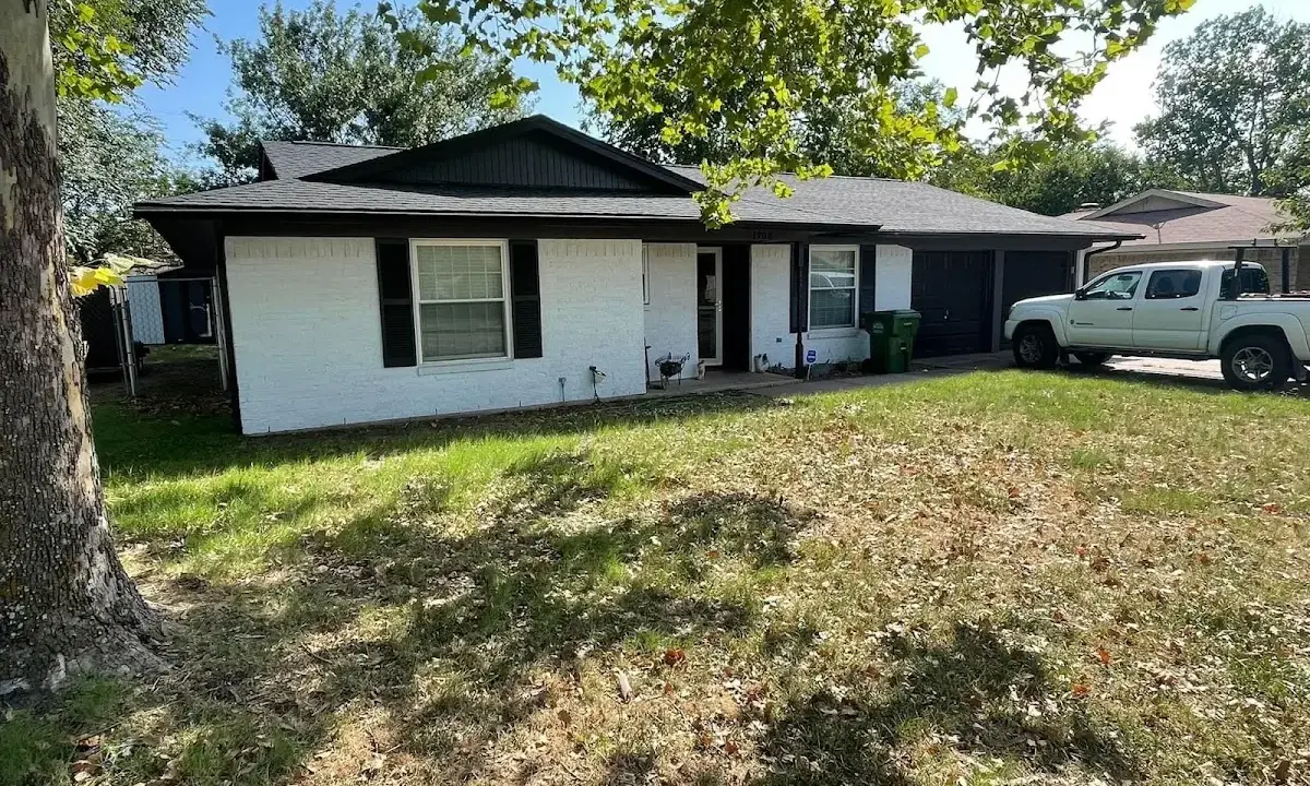 Professional roofing crew working on a residential roof in Chula Vista